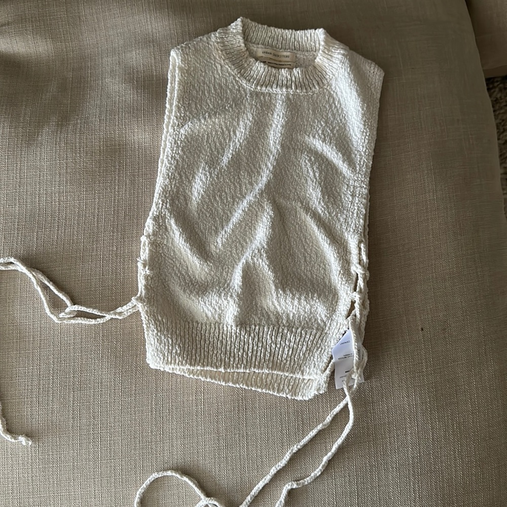 Urban outfitters sleeveless sweater.